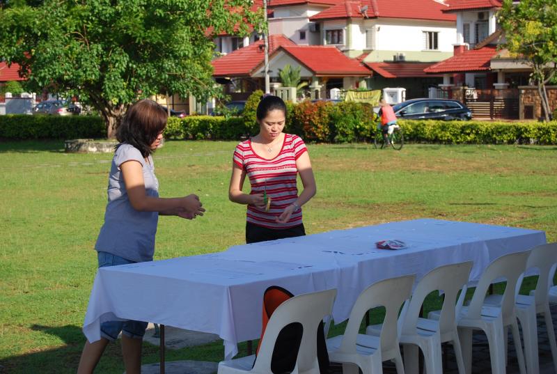 Mrs Yeak and April busy preparing the member registration counter